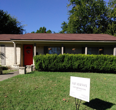 EqualKnox yard sign in front of a brick ranch home during a roof project